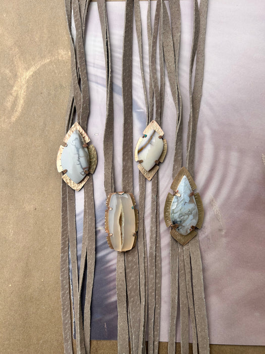 white agate with hand-cut suede