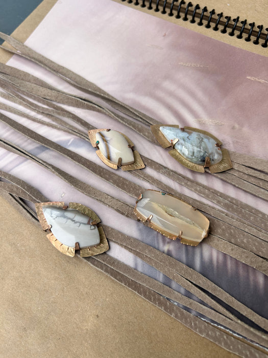 white agate with hand-cut suede