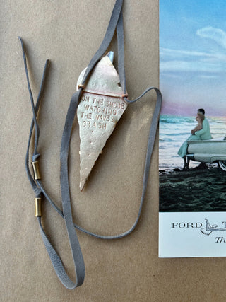 Seashell and gray suede