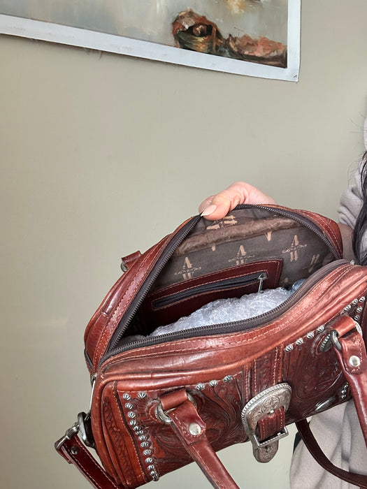 Western style tooled leather bag