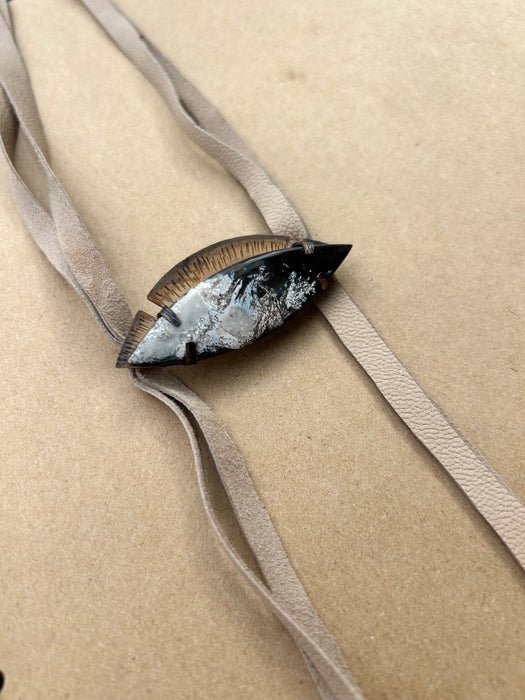 Black and tan petrified wood suede bolo tie