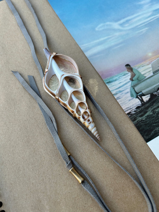Seashell and gray suede