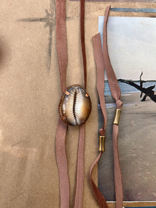Cowrie shell bolo tie