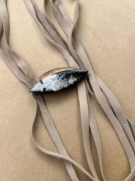 Black and tan petrified wood suede bolo tie